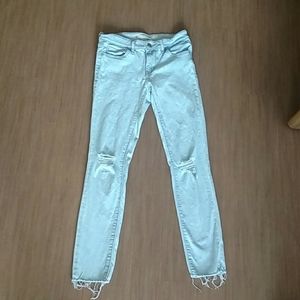 Light Blue ripped 711 Skinny cropped Levis